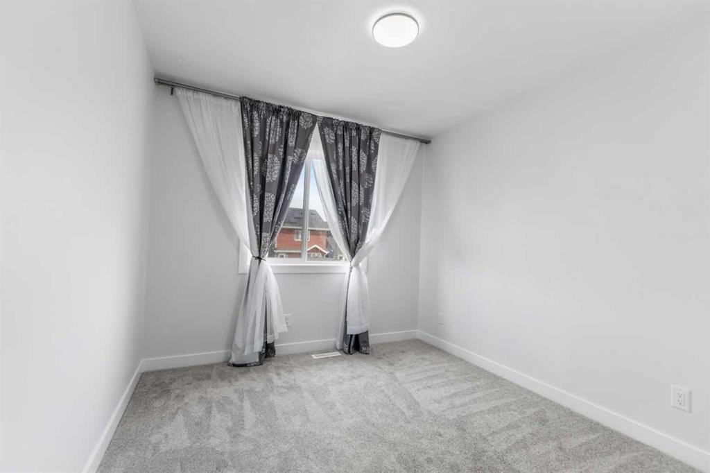 150 Ambleton Drive Nw, Calgary, AB - Indoor Photo Showing Other Room