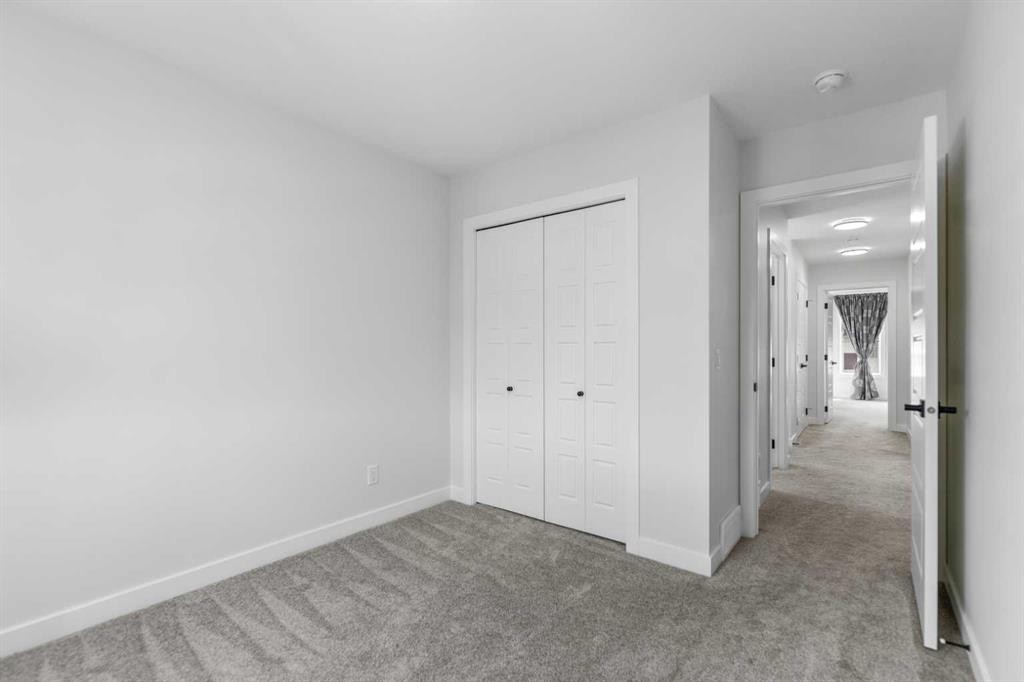 150 Ambleton Drive Nw, Calgary, AB - Indoor Photo Showing Other Room