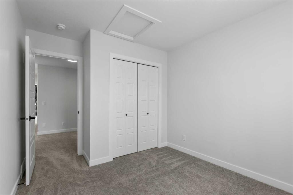 150 Ambleton Drive Nw, Calgary, AB - Indoor Photo Showing Other Room