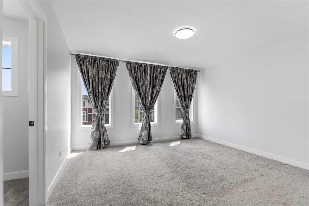 150 Ambleton Drive Nw, Calgary, AB - Indoor Photo Showing Other Room