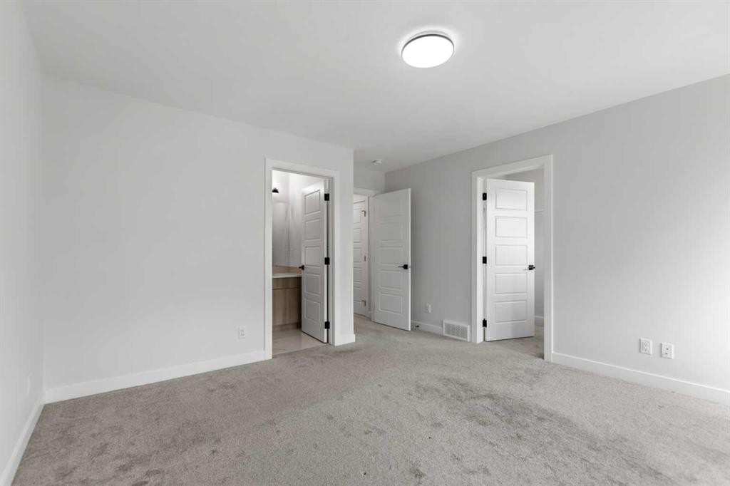 150 Ambleton Drive Nw, Calgary, AB - Indoor Photo Showing Other Room