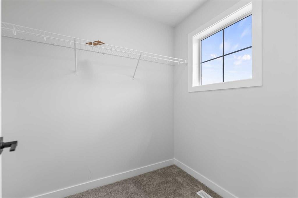 150 Ambleton Drive Nw, Calgary, AB - Indoor Photo Showing Other Room