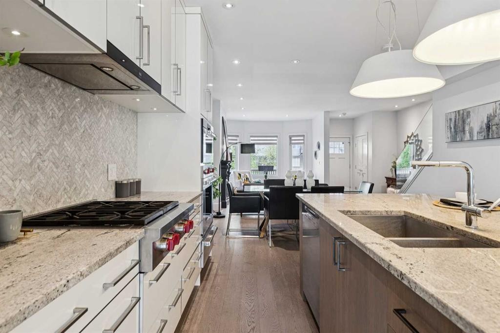 911 18 Avenue Sw, Calgary, AB - Indoor Photo Showing Kitchen With Double Sink With Upgraded Kitchen