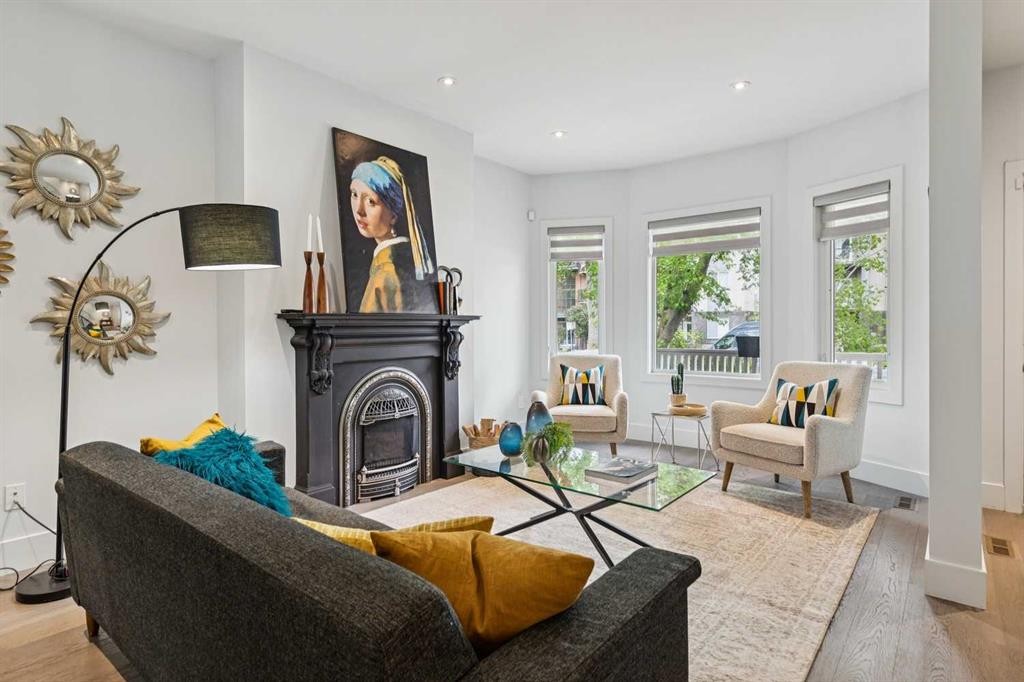 911 18 Avenue Sw, Calgary, AB - Indoor Photo Showing Living Room With Fireplace