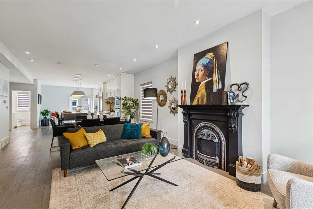 911 18 Avenue Sw, Calgary, AB - Indoor Photo Showing Living Room With Fireplace