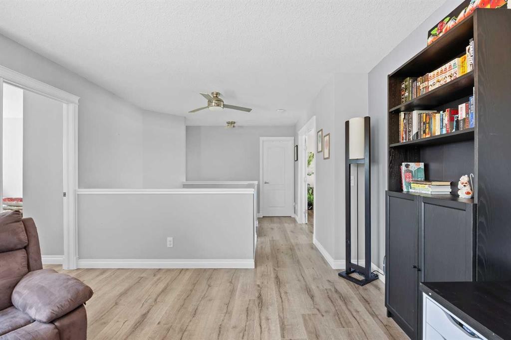 18 Hidden Creek Manor Nw, Calgary, AB - Indoor Photo Showing Other Room