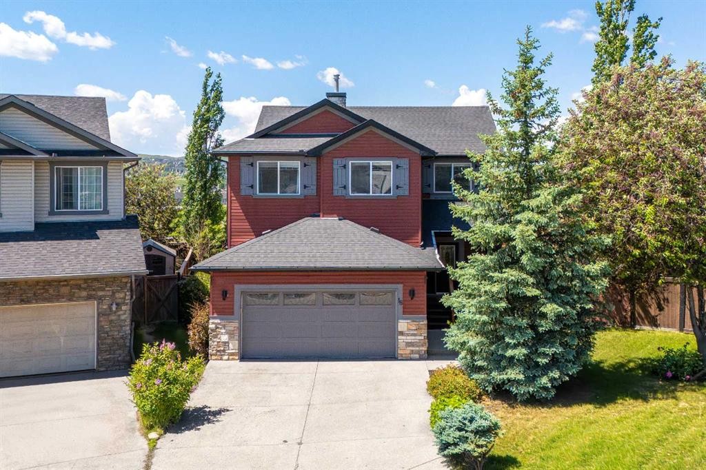 18 Hidden Creek Manor Nw, Calgary, AB - Outdoor With Facade