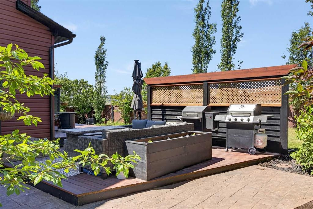 18 Hidden Creek Manor Nw, Calgary, AB - Outdoor With Deck Patio Veranda With Exterior
