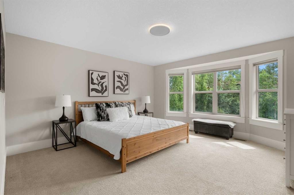 11 Aspen Cliff Place Sw, Calgary, AB - Indoor Photo Showing Bedroom