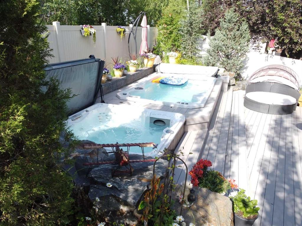 11 Aspen Cliff Place Sw, Calgary, AB - Outdoor With Deck Patio Veranda