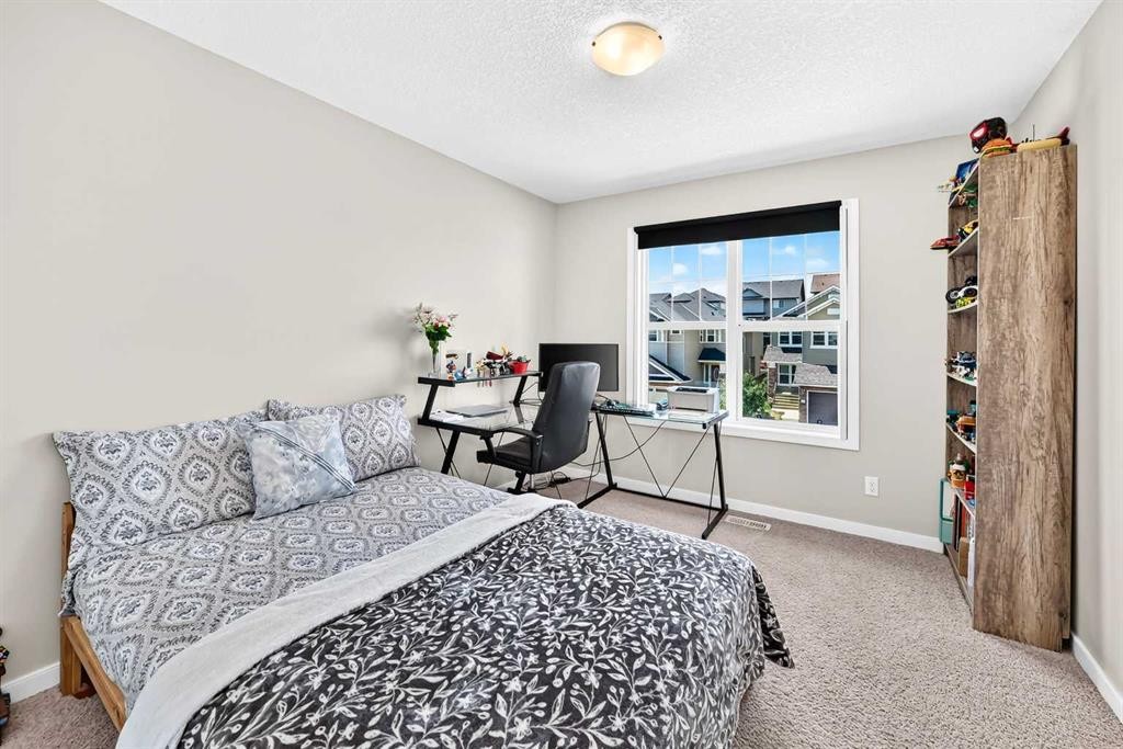 56 Panatella Parade Nw, Calgary, AB - Indoor Photo Showing Bedroom