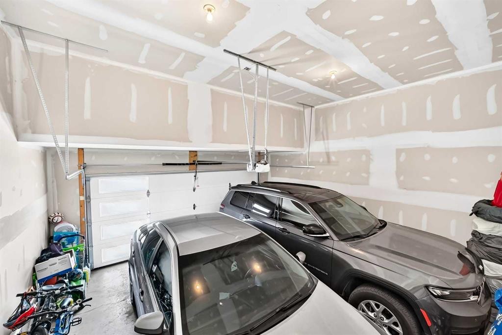 56 Panatella Parade Nw, Calgary, AB - Indoor Photo Showing Garage