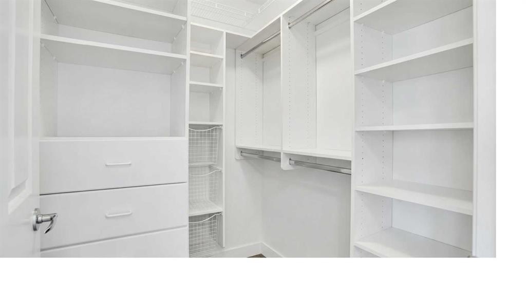 6 Discovery Woods Villas Sw, Calgary, AB - Indoor With Storage