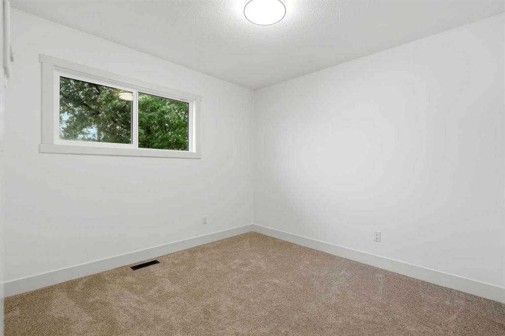 908 Stonehaven Road Sw, Calgary, AB - Indoor Photo Showing Other Room