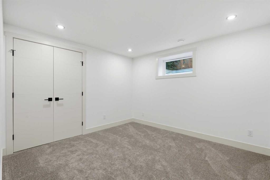 908 Stonehaven Road Sw, Calgary, AB - Indoor Photo Showing Other Room
