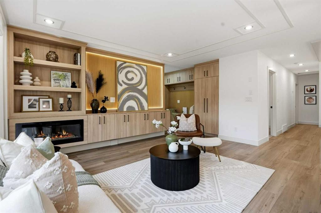 908 Stonehaven Road Sw, Calgary, AB - Indoor Photo Showing Other Room With Fireplace