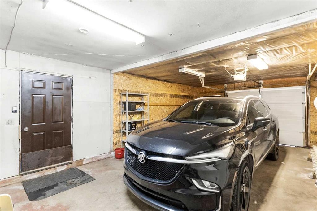 7 Tamarack Crescent Nw, Sundre, AB - Indoor Photo Showing Garage