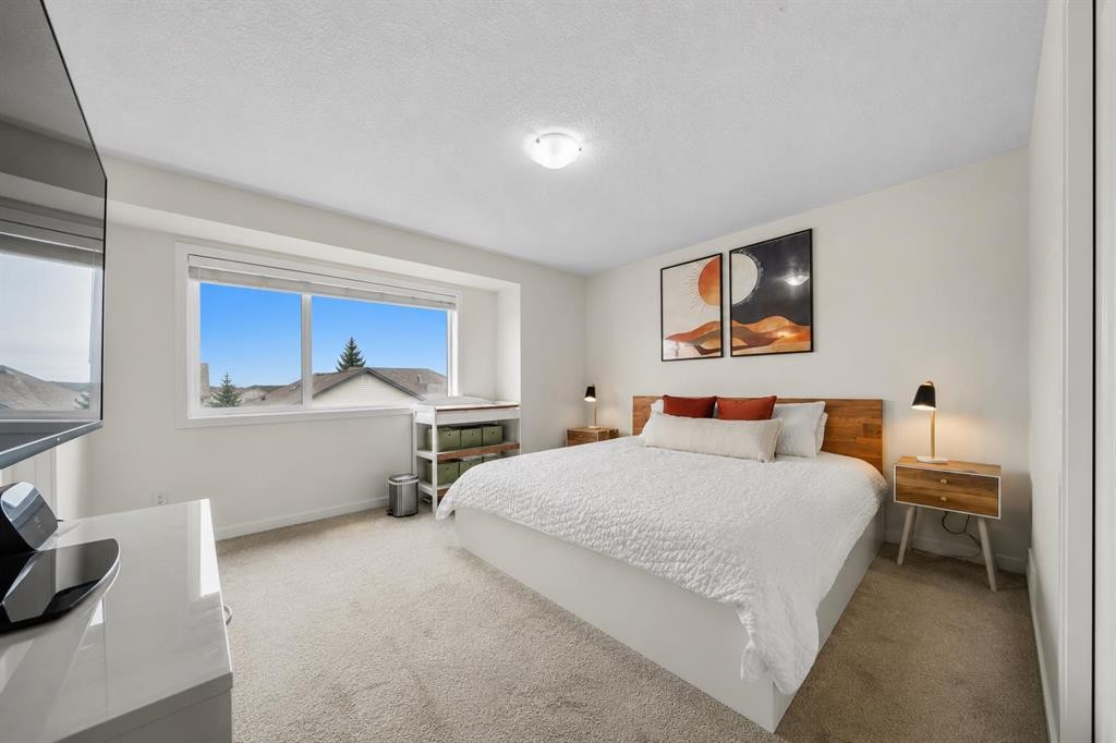 418 Copperstone Manor Se, Calgary, AB - Indoor Photo Showing Bedroom