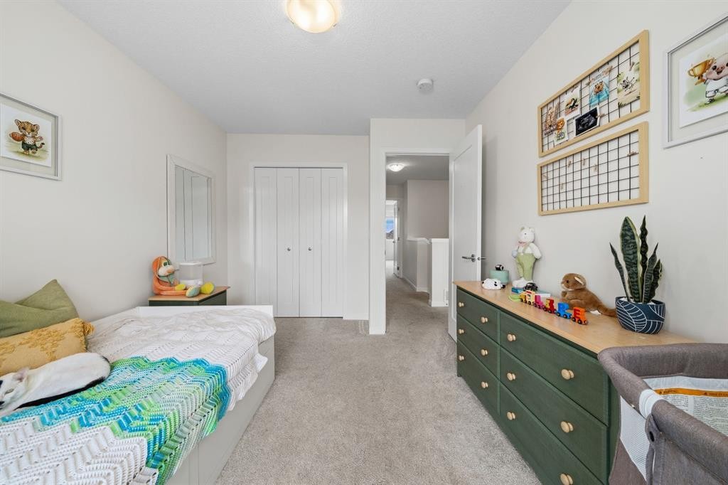 418 Copperstone Manor Se, Calgary, AB - Indoor Photo Showing Bedroom