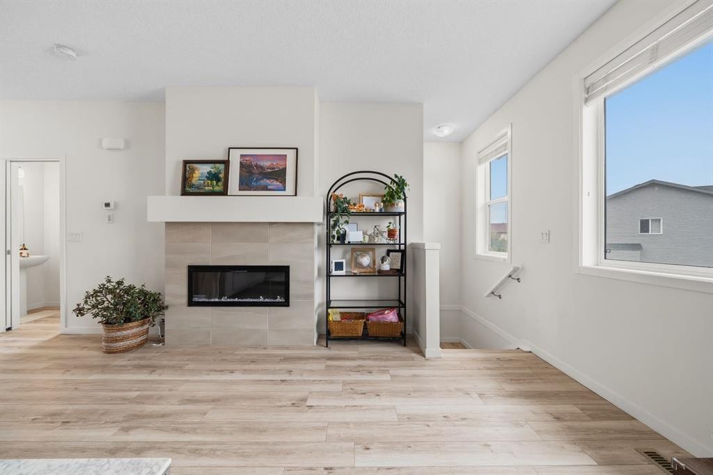 418 Copperstone Manor Se, Calgary, AB - Indoor With Fireplace