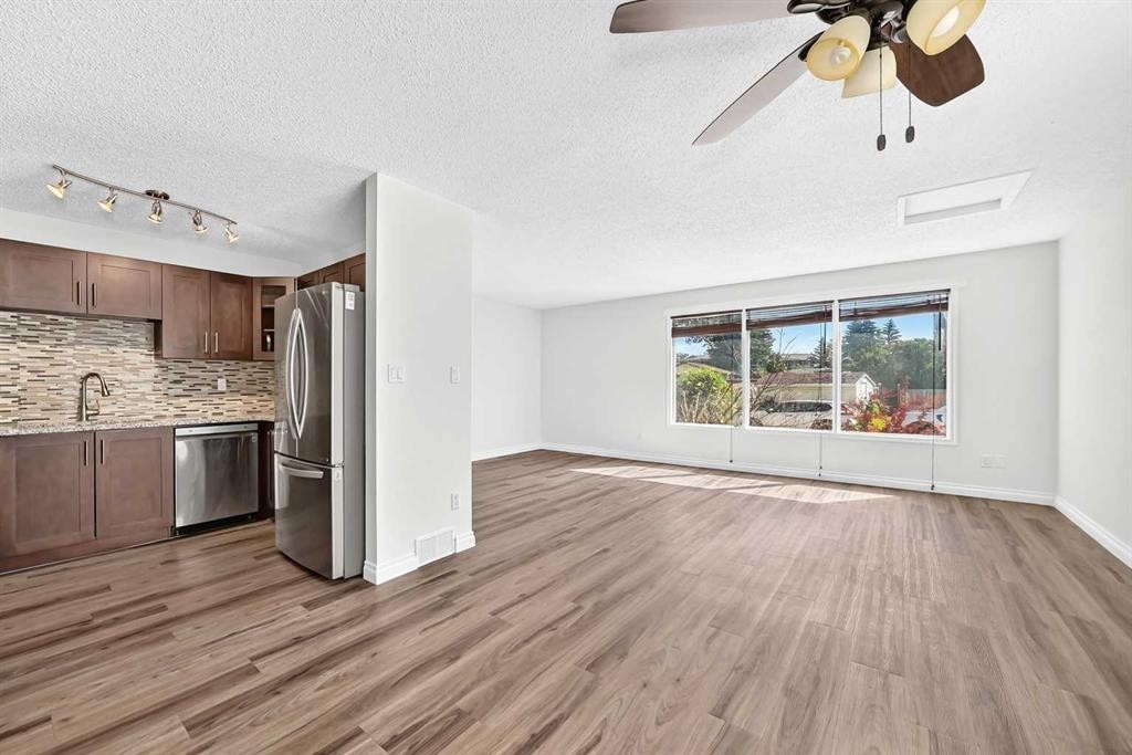 91 Cedarwood Hill Sw, Calgary, AB - Indoor Photo Showing Kitchen With Stainless Steel Kitchen With Upgraded Kitchen