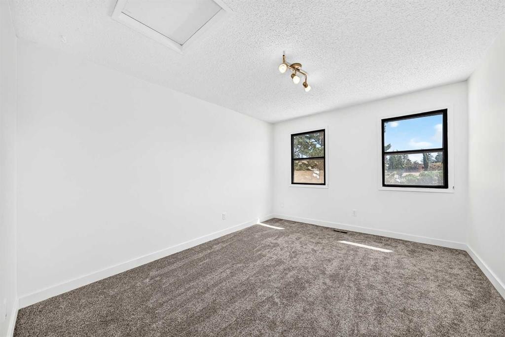 91 Cedarwood Hill Sw, Calgary, AB - Indoor Photo Showing Other Room