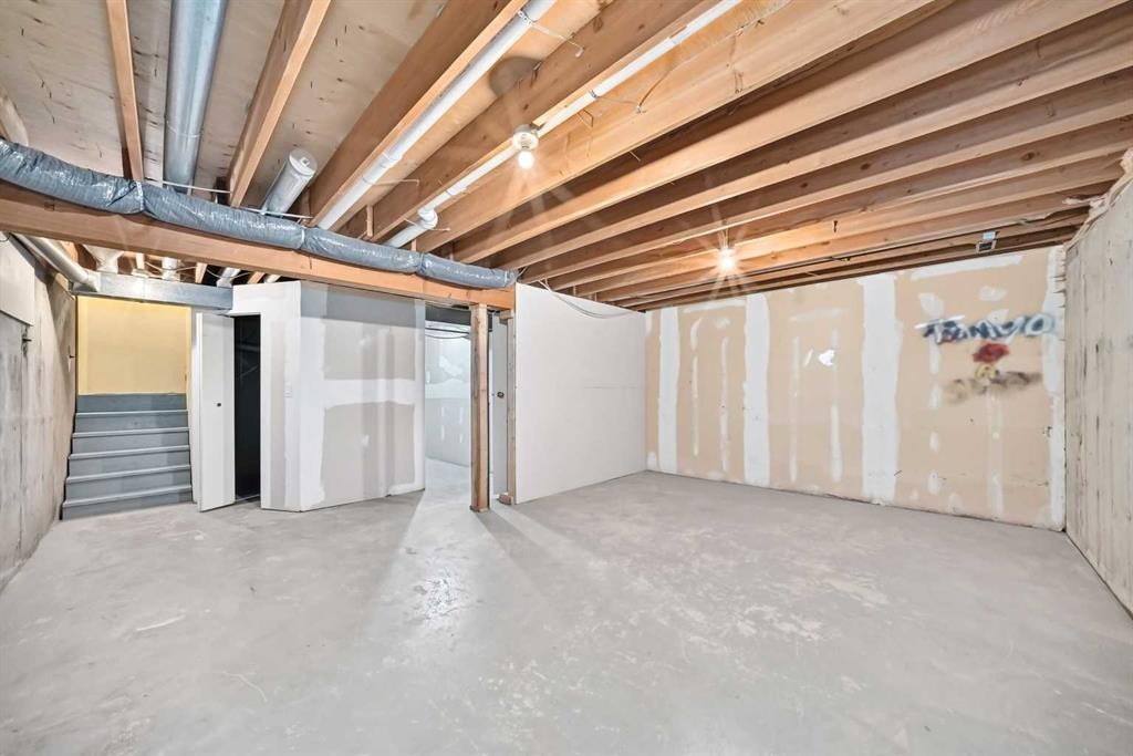 91 Cedarwood Hill Sw, Calgary, AB - Indoor Photo Showing Basement
