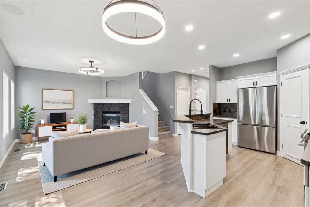 137 Prestwick Mews Se, Calgary, AB - Indoor With Fireplace