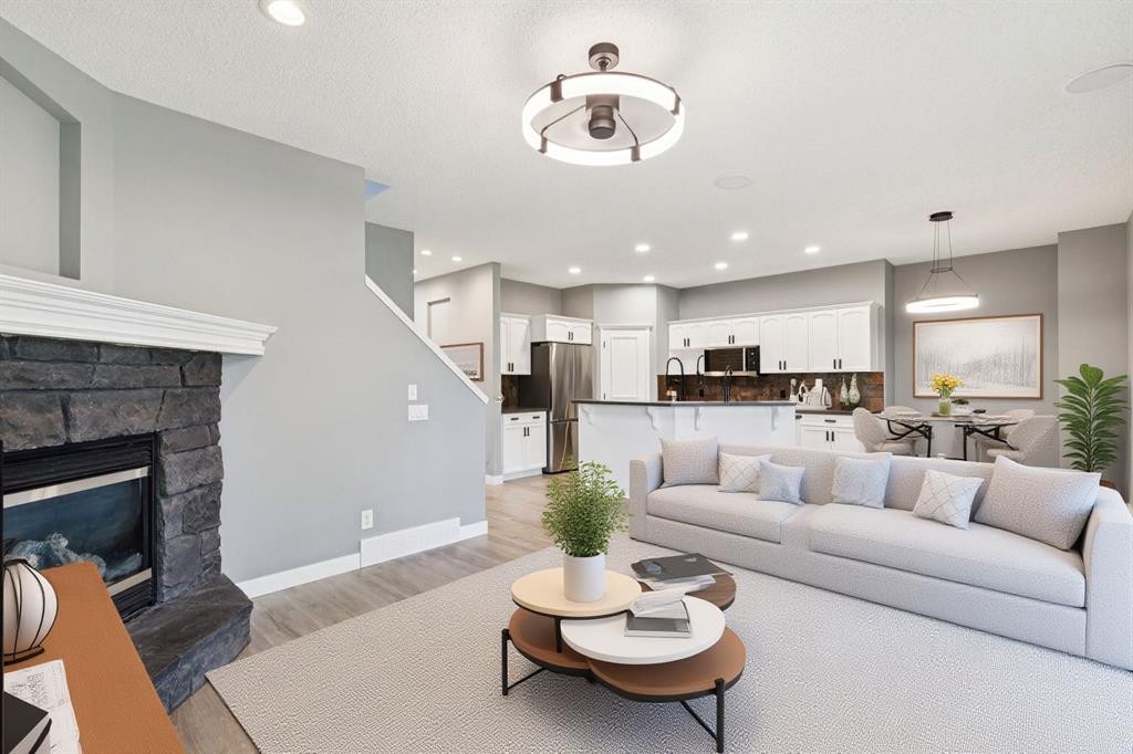 137 Prestwick Mews Se, Calgary, AB - Indoor Photo Showing Living Room With Fireplace