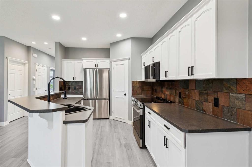 137 Prestwick Mews Se, Calgary, AB - Indoor Photo Showing Kitchen With Stainless Steel Kitchen With Upgraded Kitchen