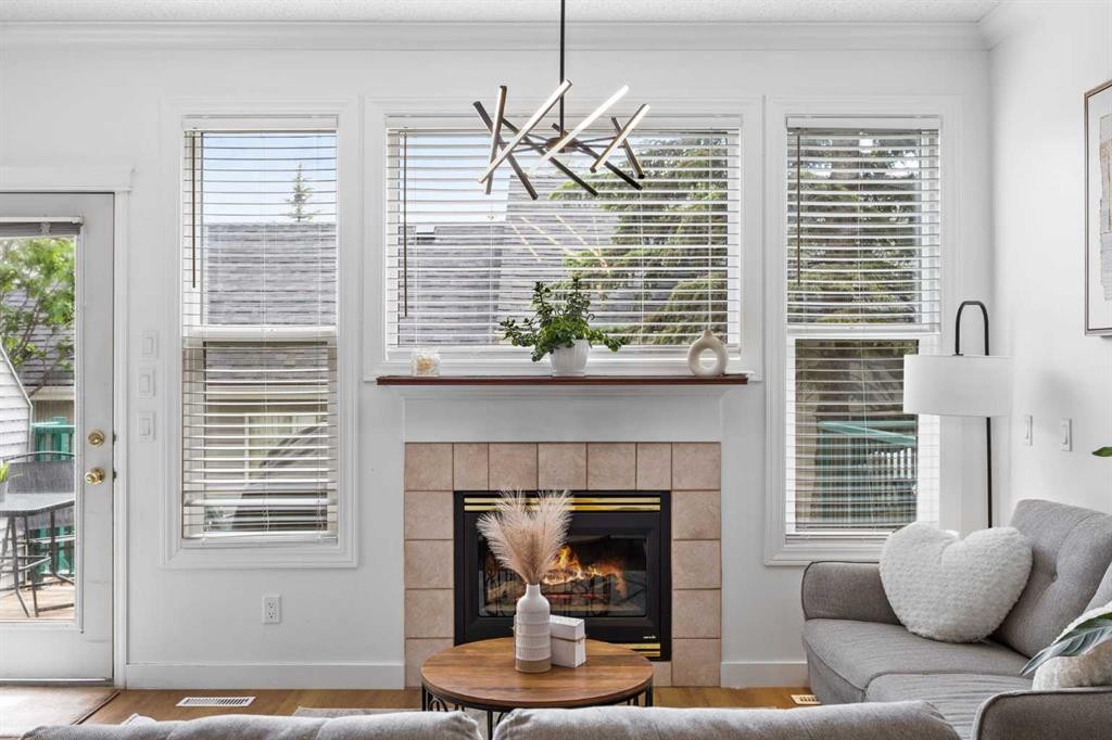 59 Prestwick Park Se, Calgary, AB - Indoor Photo Showing Living Room With Fireplace