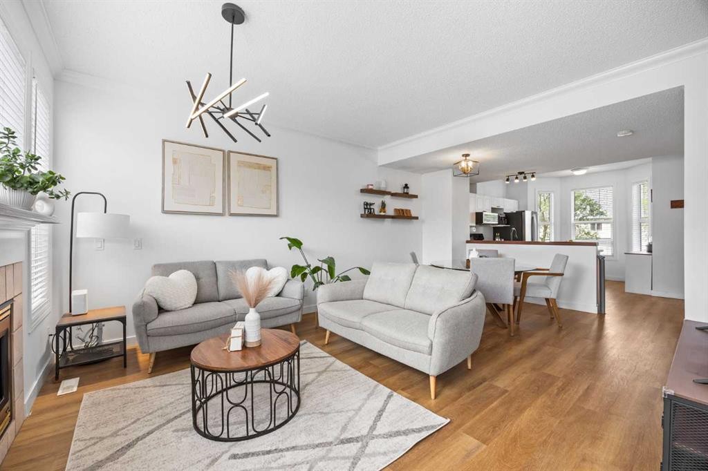 59 Prestwick Park Se, Calgary, AB - Indoor Photo Showing Living Room With Fireplace