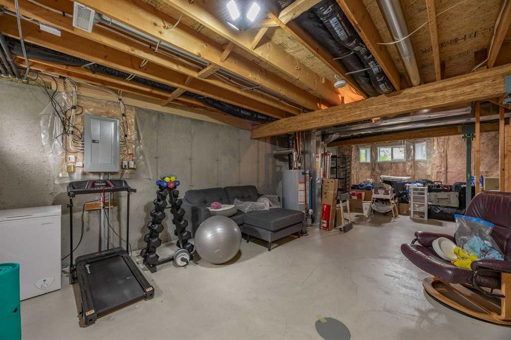 59 Prestwick Park Se, Calgary, AB - Indoor Photo Showing Basement