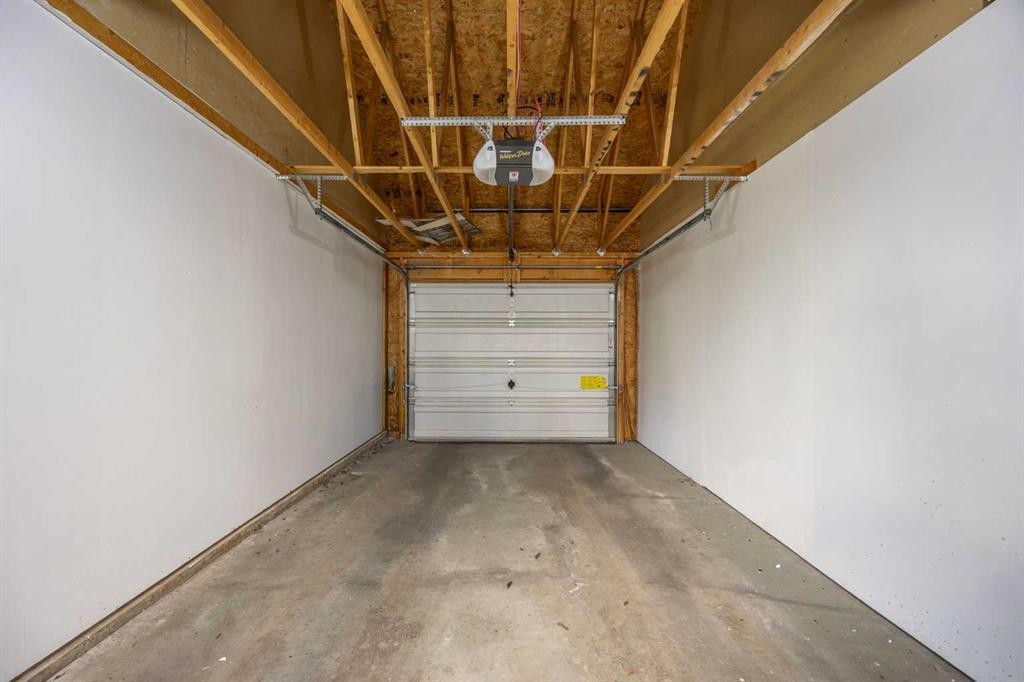 59 Prestwick Park Se, Calgary, AB - Indoor Photo Showing Garage