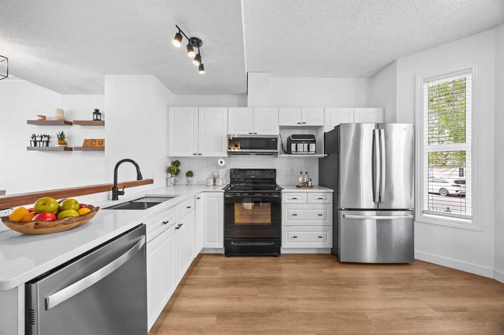 59 Prestwick Park Se, Calgary, AB - Indoor Photo Showing Kitchen With Stainless Steel Kitchen