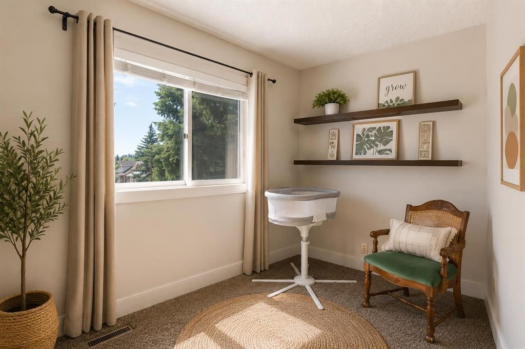 56 Deersaxon Circle Se, Calgary, AB - Indoor Photo Showing Other Room