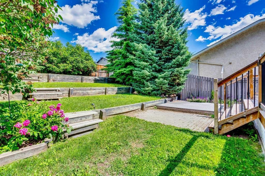 56 Deersaxon Circle Se, Calgary, AB - Outdoor With Deck Patio Veranda