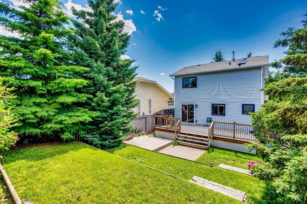 56 Deersaxon Circle Se, Calgary, AB - Outdoor With Deck Patio Veranda