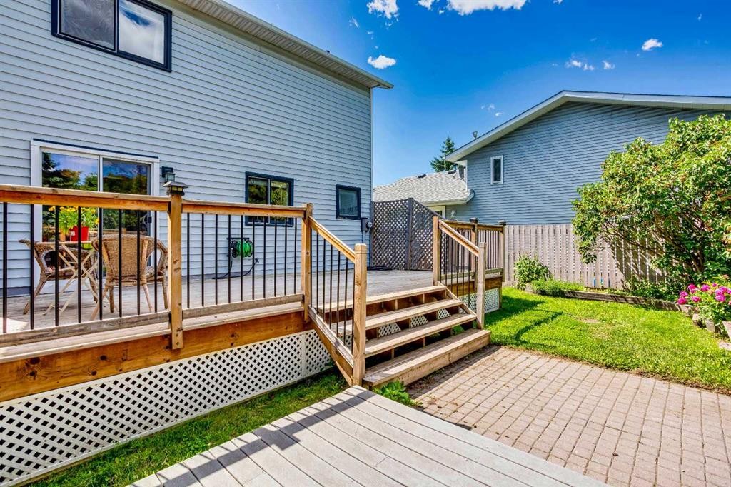 56 Deersaxon Circle Se, Calgary, AB - Outdoor With Deck Patio Veranda With Exterior