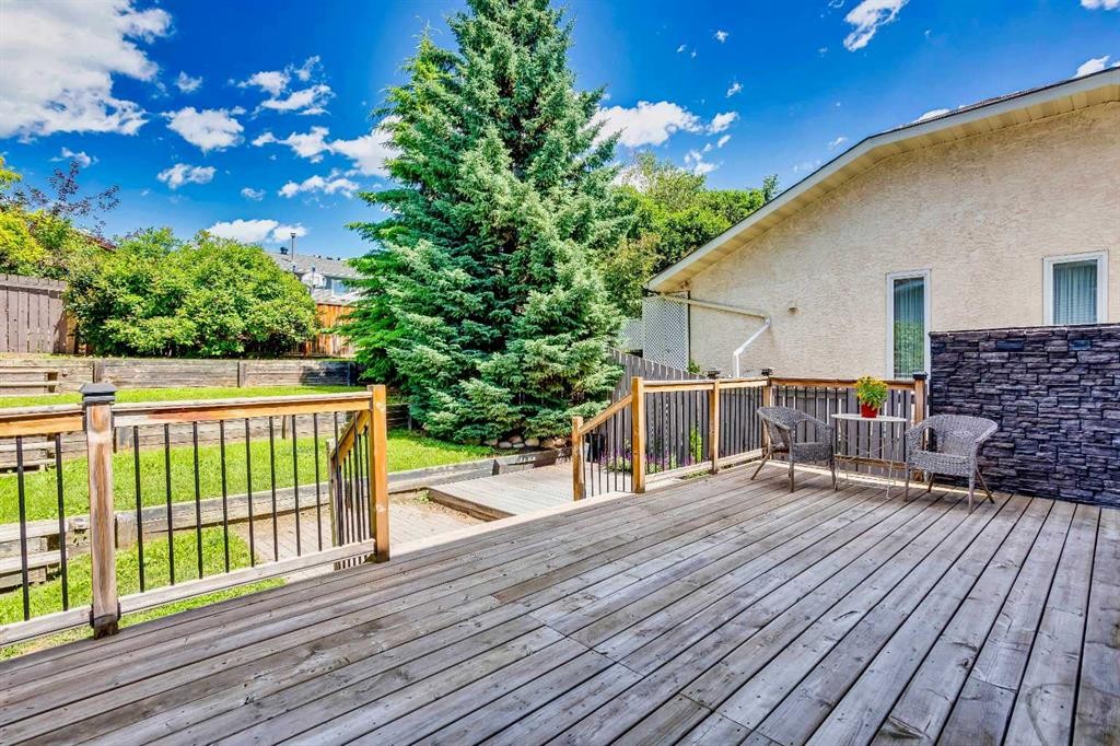 56 Deersaxon Circle Se, Calgary, AB - Outdoor With Deck Patio Veranda