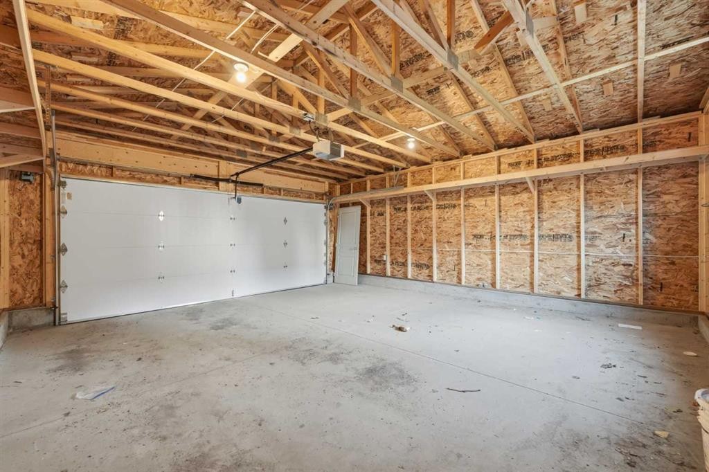 151 Royal Oak Drive Nw, Calgary, AB - Indoor Photo Showing Garage