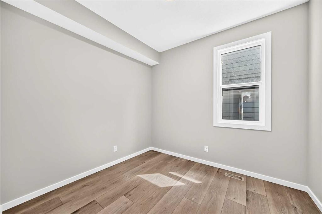 48 Creekside Path Sw, Calgary, AB - Indoor Photo Showing Other Room