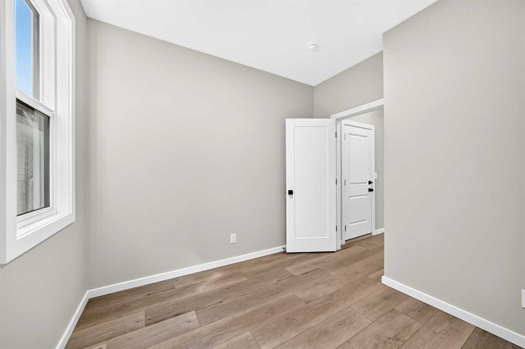 48 Creekside Path Sw, Calgary, AB - Indoor Photo Showing Other Room