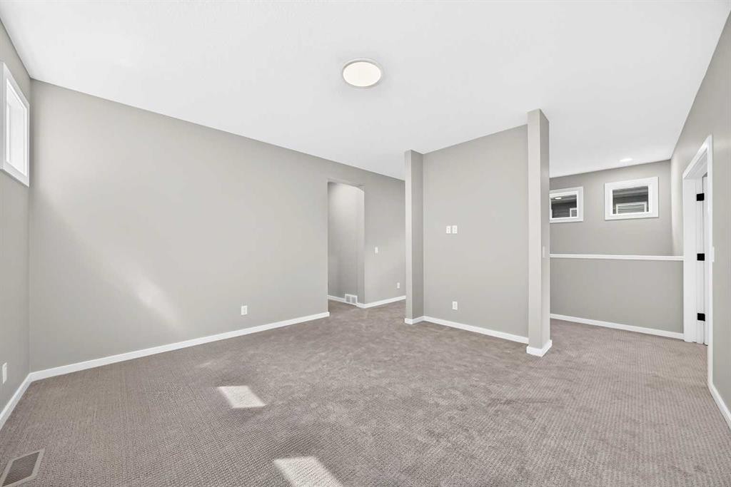48 Creekside Path Sw, Calgary, AB - Indoor Photo Showing Other Room