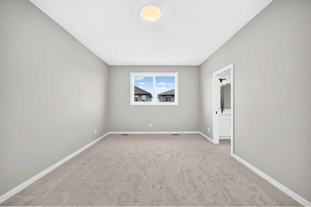 48 Creekside Path Sw, Calgary, AB - Indoor Photo Showing Other Room