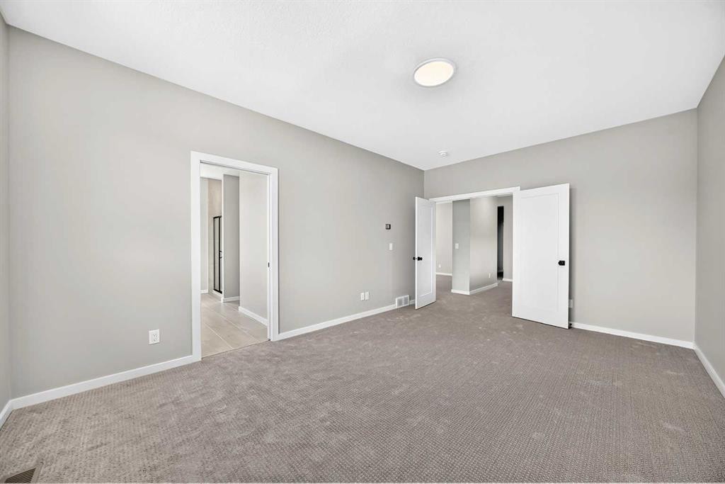 48 Creekside Path Sw, Calgary, AB - Indoor Photo Showing Other Room