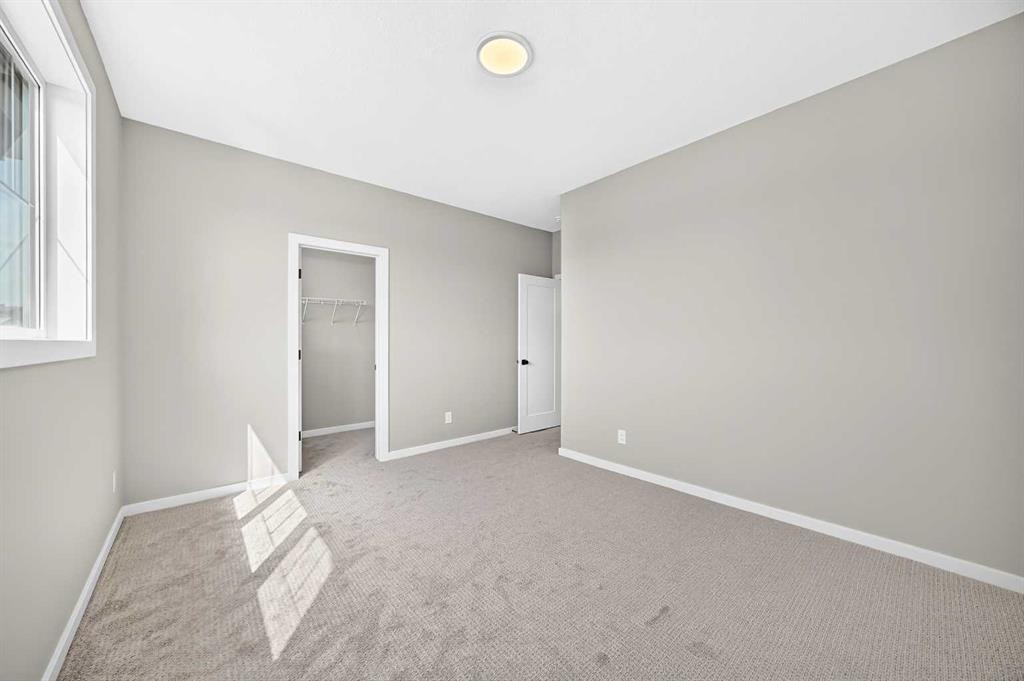 48 Creekside Path Sw, Calgary, AB - Indoor Photo Showing Other Room