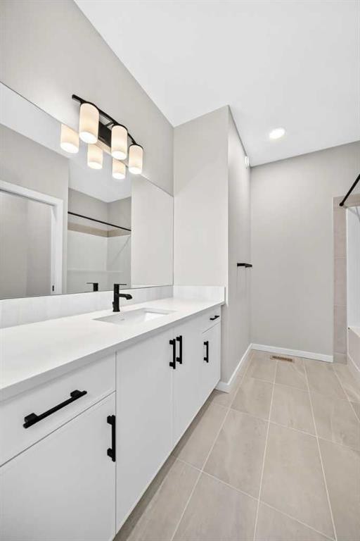 48 Creekside Path Sw, Calgary, AB - Indoor Photo Showing Bathroom
