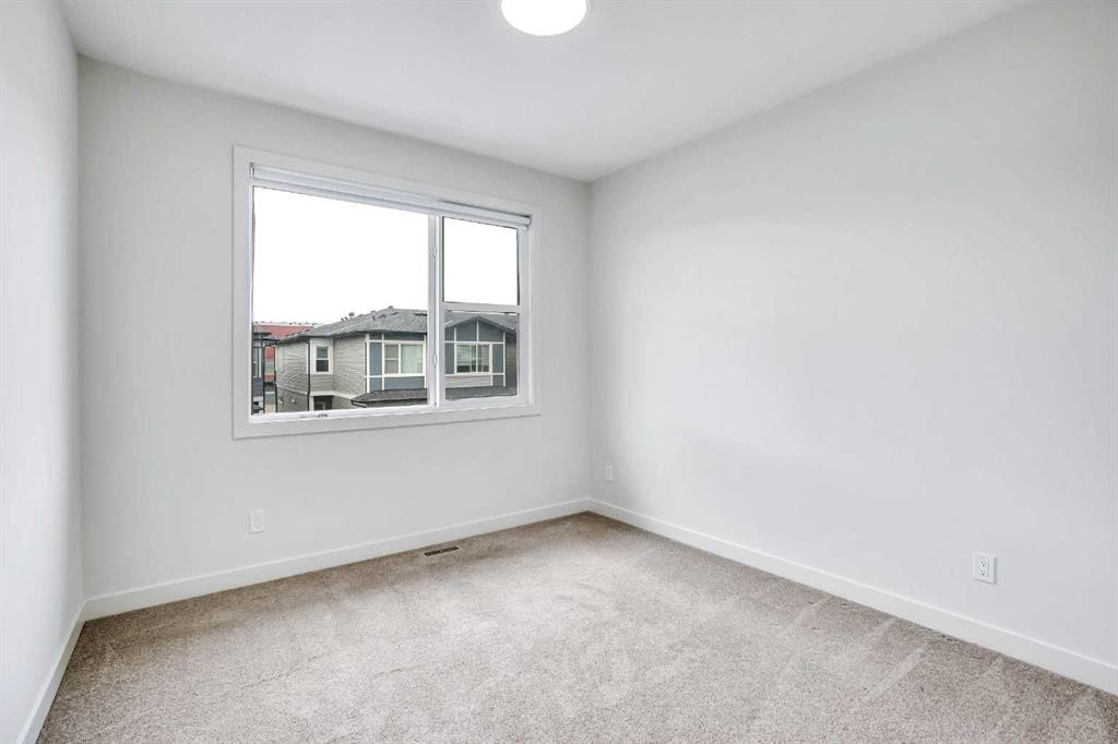 106-116 Saddlestone Heath Ne, Calgary, AB - Indoor Photo Showing Other Room