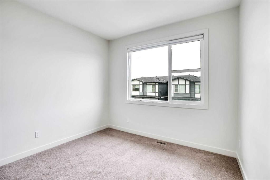 106-116 Saddlestone Heath Ne, Calgary, AB - Indoor Photo Showing Other Room